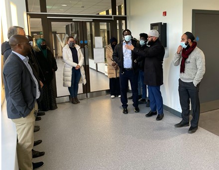 People gather in a corridor