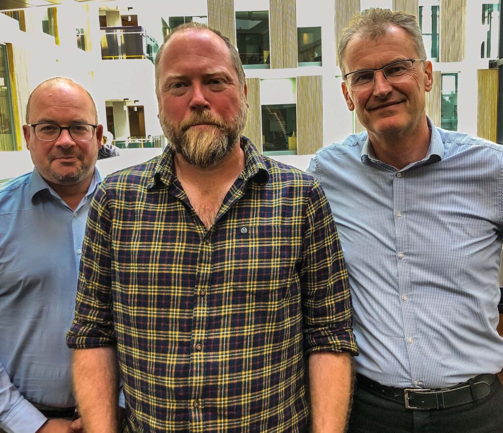 Professor Marc Griffiths, Peter Brindle and Professor Kieran McCartan standing next to one another
